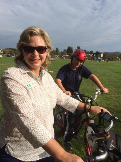Irvine Community Services Commissioner Melissa Fox and her son, Max, bicycling in Woodbridge.